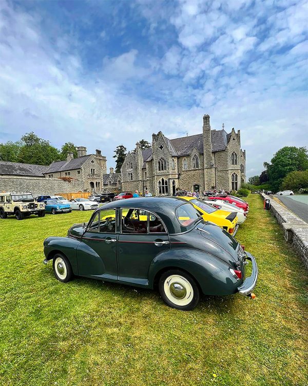 Classic cars lined up around the grounds of Mellington Hall.